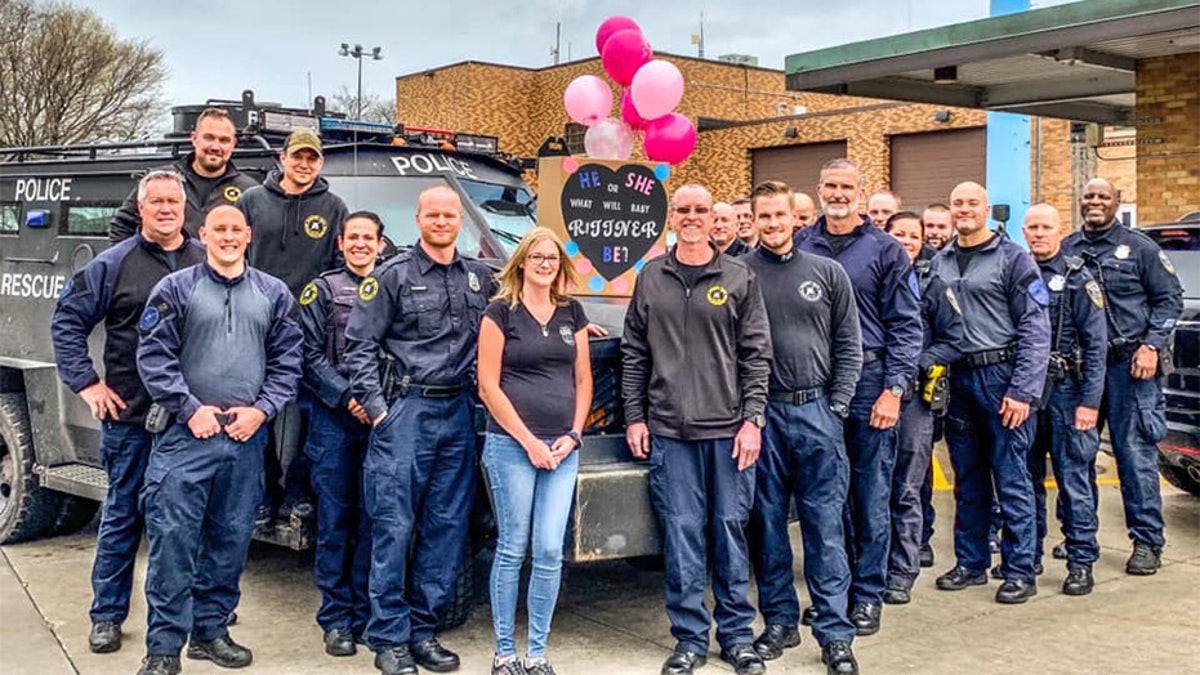 Caroline Rittner held a gender reveal party with her husband's unit at the Milwaukee Police Department after finding out that she was pregnant.
