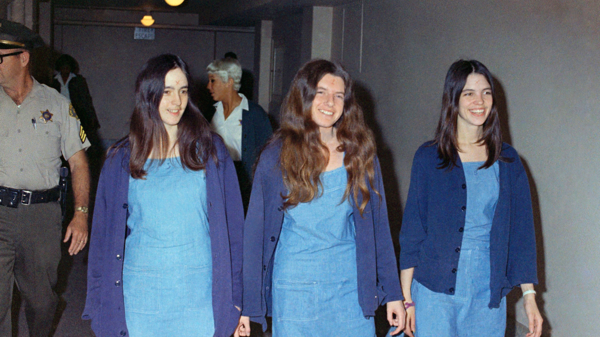 In this Aug. 20, 1970, file photo, Charles Manson followers, from left, Susan Atkins, Patricia Krenwinkel and Leslie Van Houten walk to court to appear for their roles in the 1969 cult killings of seven people in Los Angeles. (Associated Press)