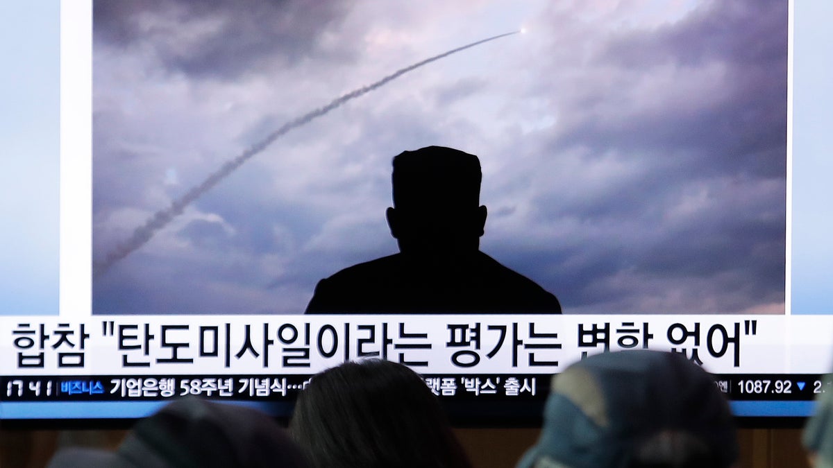 People watch a TV showing an image of North Korea's a multiple rocket launch during a news program at the Seoul Railway Station in Seoul, South Korea, Aug. 1, 2019. (Associated Press)