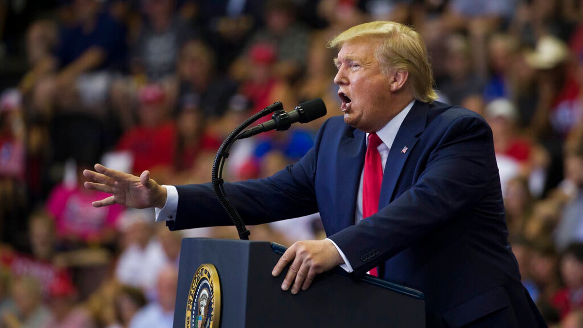 President Donald Trump speaks at a campaign rally Thursday, Aug. 1, 2019, in Cincinnati. (AP Photo/Alex Brandon)