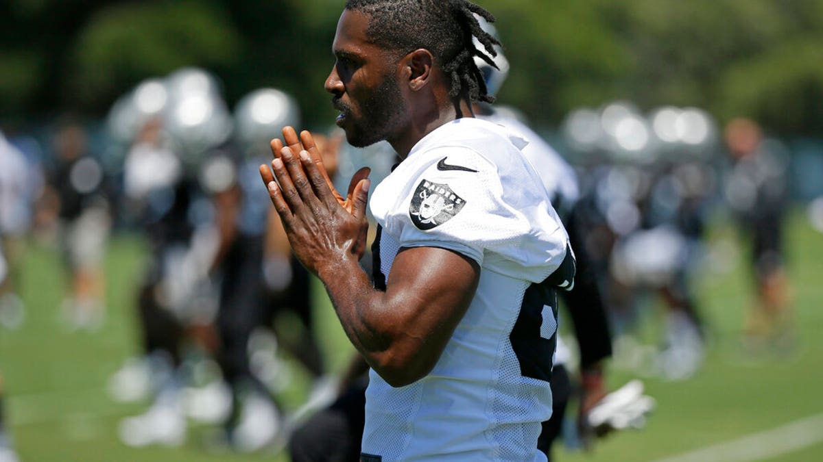 In this June 11, 2019, file photo, Oakland Raiders wide receiver Antonio Brown is shown during an NFL football minicamp in Alameda, Calif.