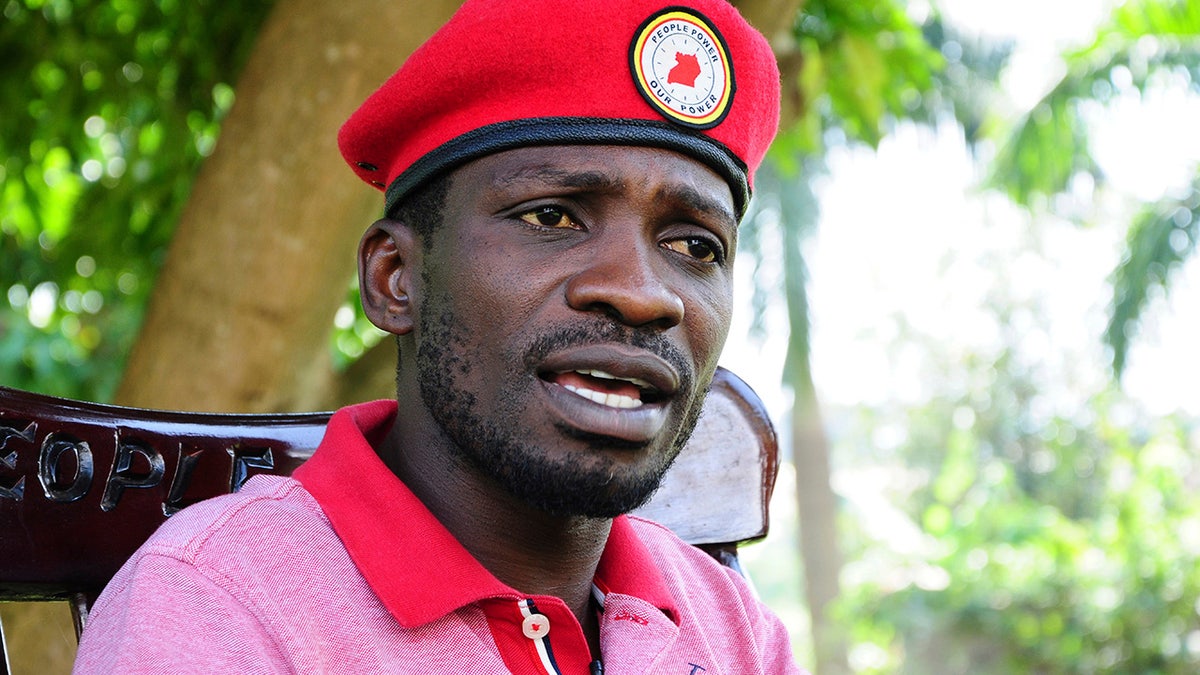 FILE- In this file photo of Monday July 15, 2019, pop star-turned-opposition lawmaker Bobi Wine, whose real name is Kyagulanyi Ssentamu, is seen while giving an interview to Associated Press at his home, Magere in Kampala, Uganda. (AP Photo/Ronald Kabuubi-File)