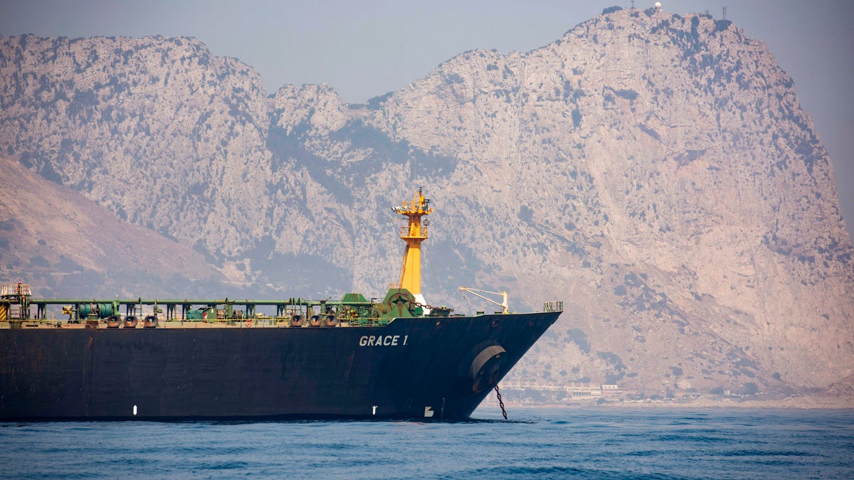 A view of the Grace 1 supertanker is seen backdropped by Gibraltar's Rock, as it stands at anchor in the British territory of Gibraltar, on Thursday.