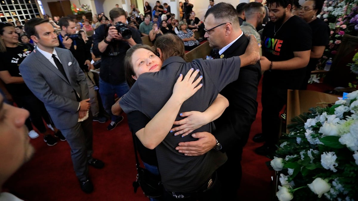 Antonio Basco, center, at her funeral Friday. (AP Photo/Jorge Salgado)