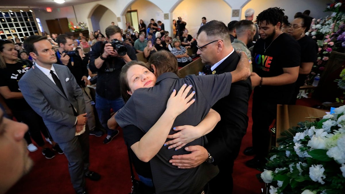 Antonio Basco, center, at her funeral Friday. (AP Photo/Jorge Salgado)