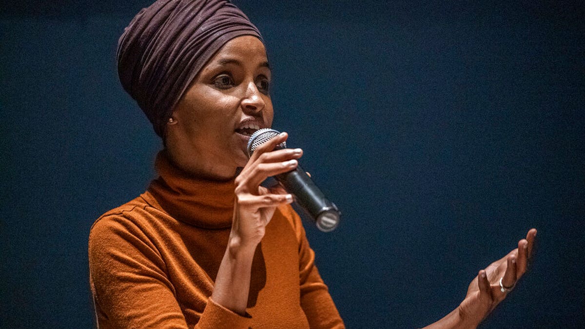 U.S. Rep. Ilhan Omar speaks at a town hall in South Minneapolis on ICE and the administration's immigration detention policies, at the Colin Powell Center in Minneapolis on Tuesday, Aug. 27, 2019. (Richard Tsong-Taatarii/Star Tribune via AP)