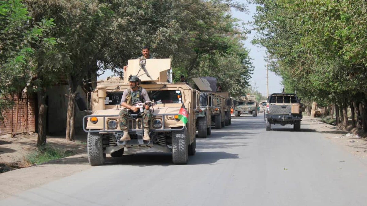 Afghan security forces arrive during a fight against Taliban fighters in Kunduz province north of Kabul, Afghanistan on Saturday. The Taliban have launched a new large-scale attack on the large city. (AP Photo/Bashir Khan Safi)