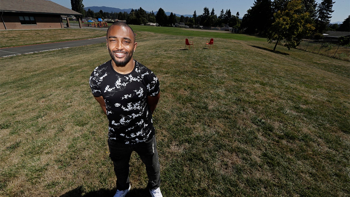 Former NFL wide receiver Doug Baldwin at the location in Renton, Wash., where he's helping create a community center.  (AP Photo/Ted S. Warren)