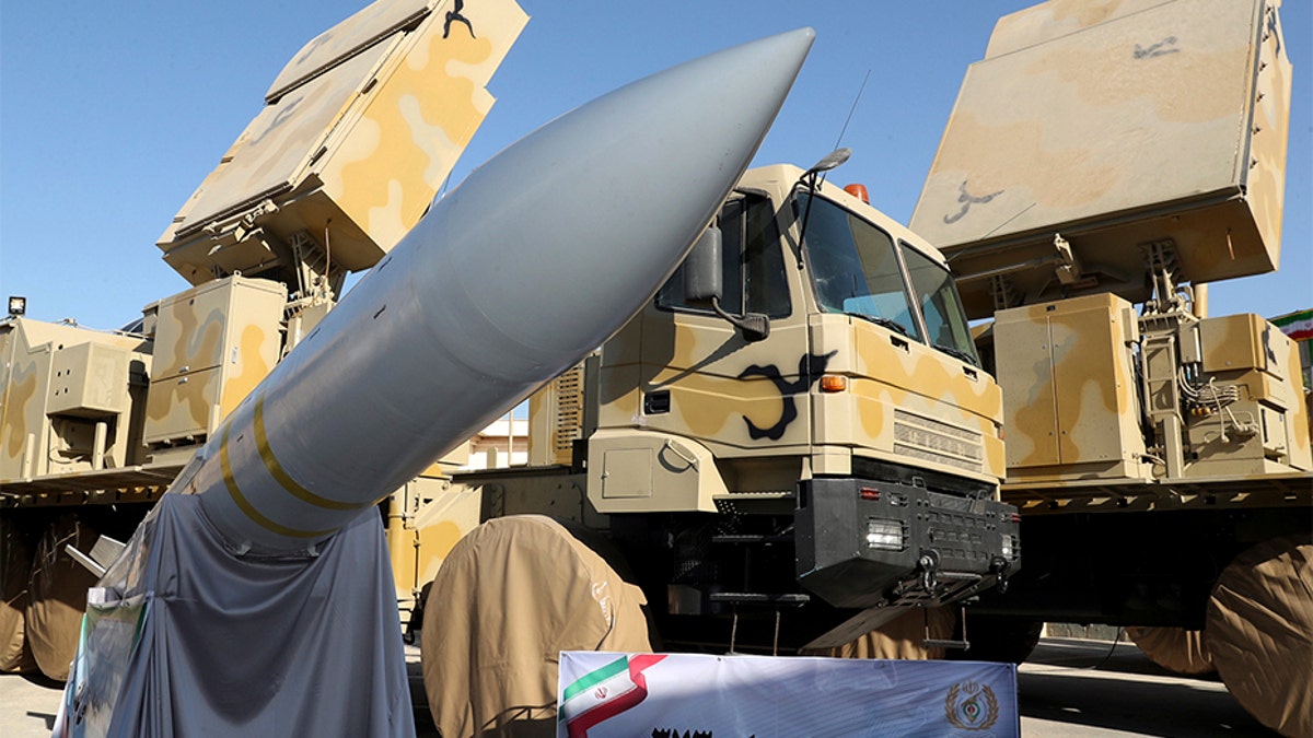 In this photo released by the office of the Iranian Presidency, tje Bavar-373 air-defense missile system is seen after being unveiled by President Hassan Rouhani in Iran on Thursday.