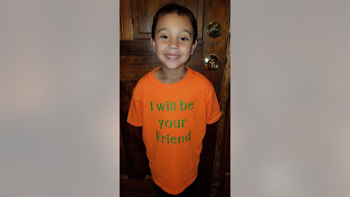 Six-year-old Blake Rajahn, pictured, wearing his internet-famous shirt.