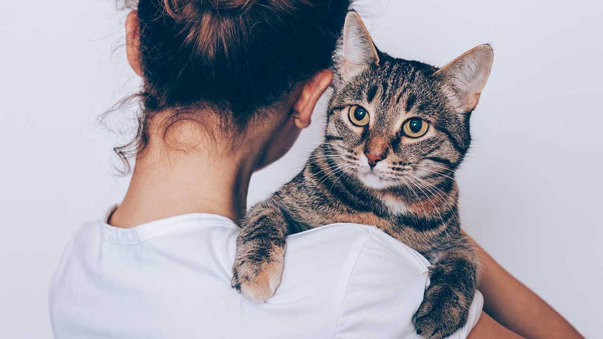 Woman with a pet cat