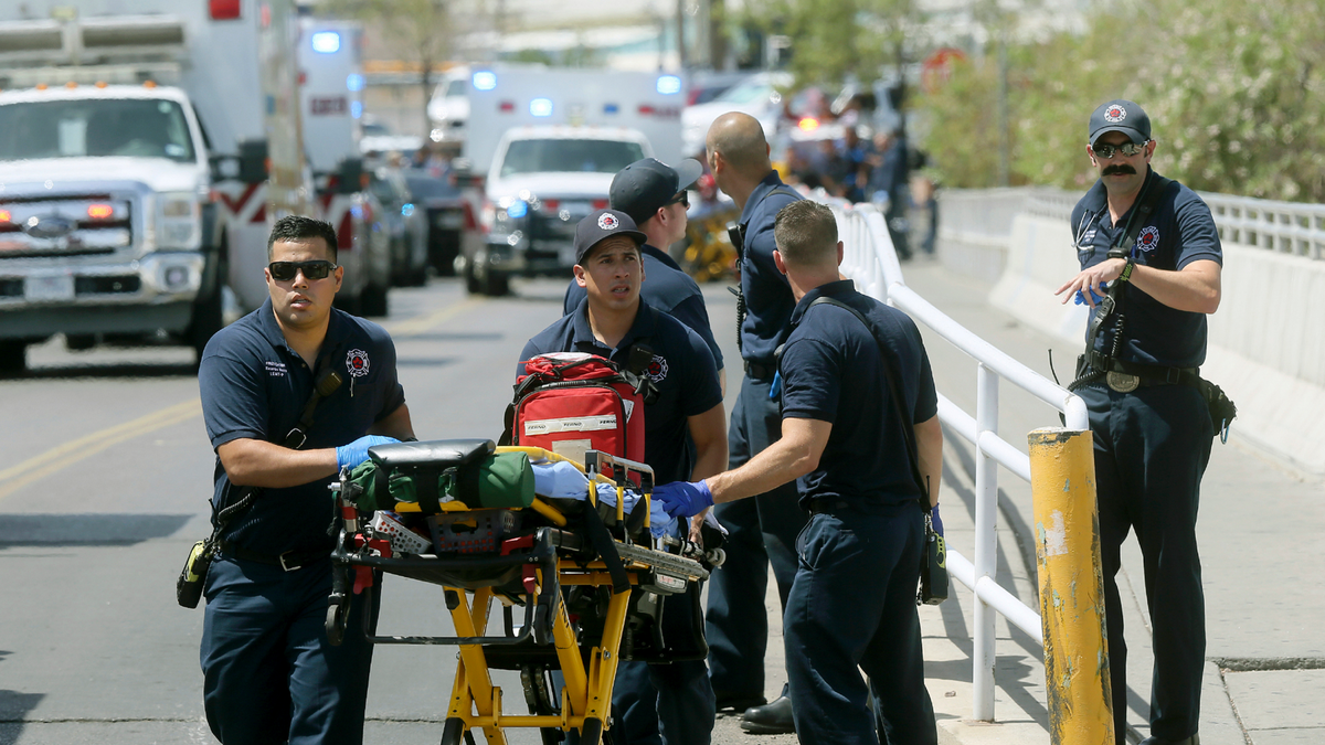 El Paso Fire Medical personnel arrive at the scene of a shooting at a Walmart near the Cielo Vista Mall in El Paso, Texas, on Aug. 3, 2019.  (Mark Lambie/The El Paso Times via AP, File)