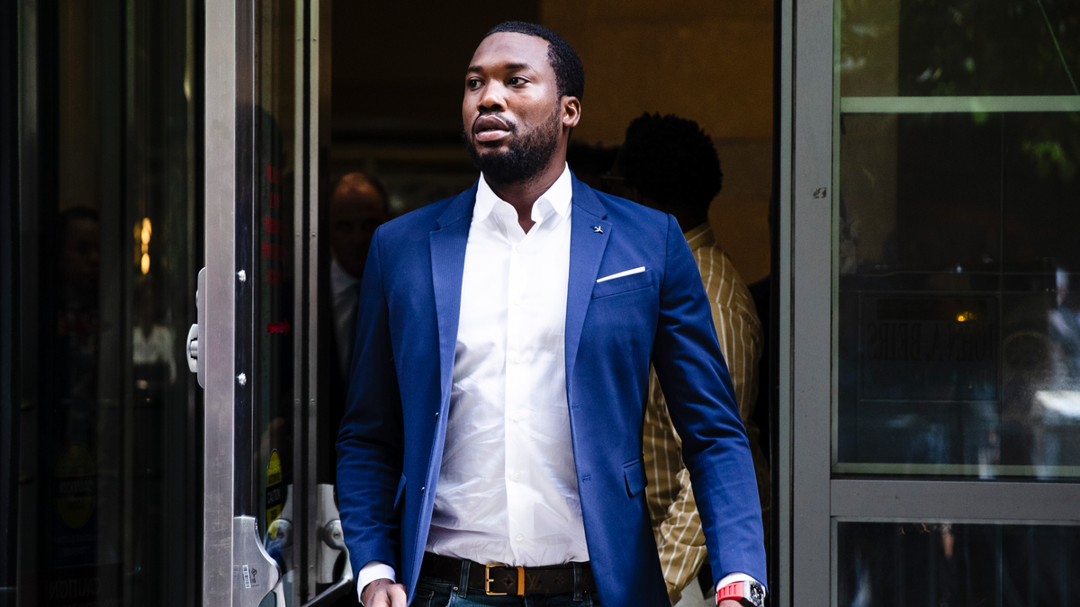 FILE - In this Aug. 6, 2019 file photo, Rapper Meek Mill departs from the criminal justice center in Philadelphia after a status hearing. Mill is due in court Tuesday to learn if Philadelphia prosecutors will drop a 2007 case that’s kept him under court supervision for more than a decade. (AP Photo/Matt Rourke, File)