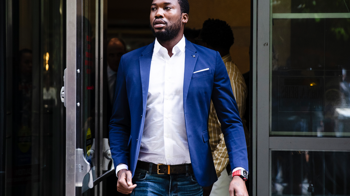 FILE - In this Aug. 6, 2019 file photo, Rapper Meek Mill departs from the criminal justice center in Philadelphia after a status hearing. Mill is due in court Tuesday to learn if Philadelphia prosecutors will drop a 2007 case that’s kept him under court supervision for more than a decade. (AP Photo/Matt Rourke, File)