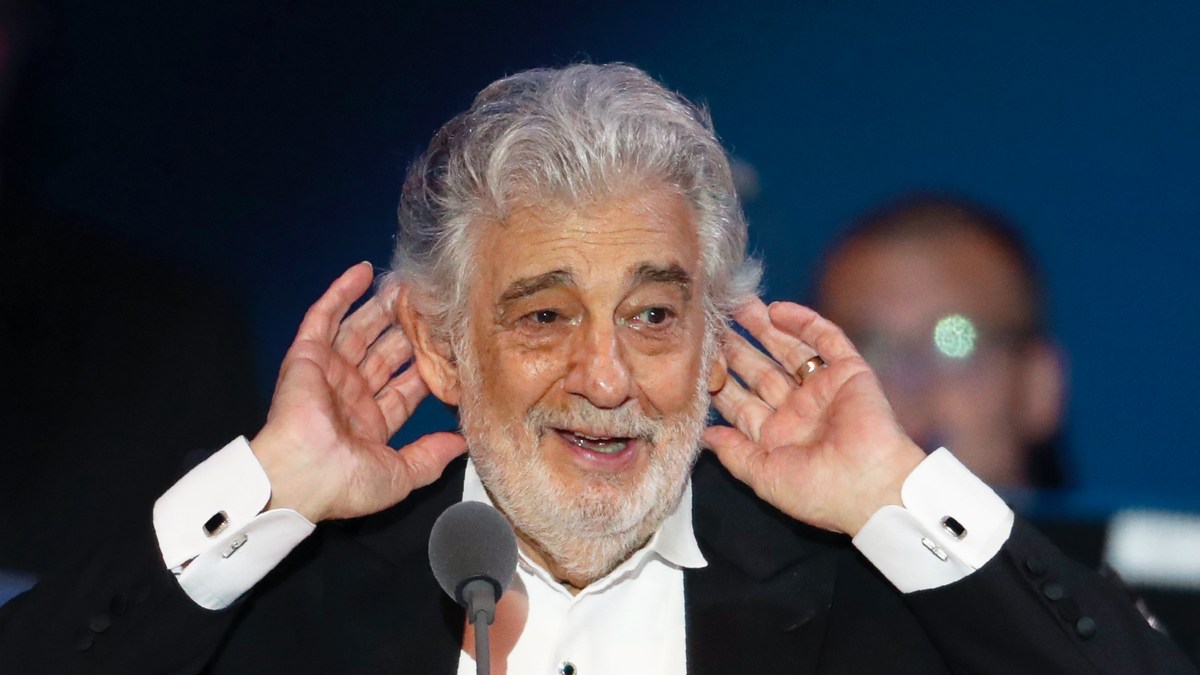 Opera star Placido Domingo listens to applause at the end of a concert in Szeged, Hungary, Wednesday, Aug. 28, 2019. Domingo continued his calendar of European engagements unabated despite allegations of sexual harassment, appearing Wednesday at a concert in southern Hungary to inaugurate a sports complex for a local Catholic diocese.