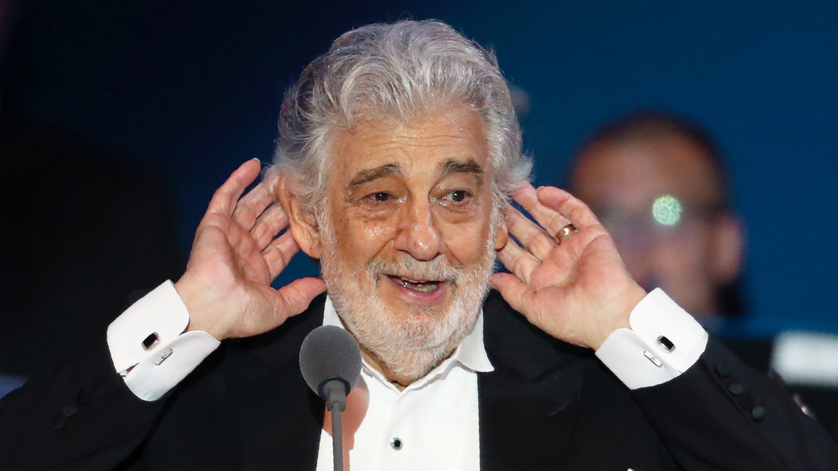 Opera star Placido Domingo listens to applause at the end of a concert in Szeged, Hungary, Wednesday, Aug. 28, 2019. Domingo continued his calendar of European engagements unabated despite allegations of sexual harassment, appearing Wednesday at a concert in southern Hungary to inaugurate a sports complex for a local Catholic diocese.