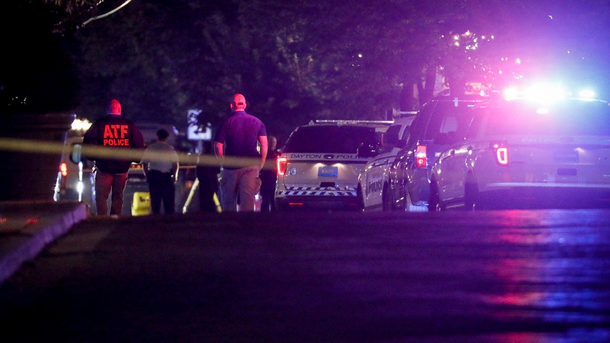 Authorities work at the scene of a mass shooting, Sunday, Aug. 4, 2019, in Dayton, Ohio.