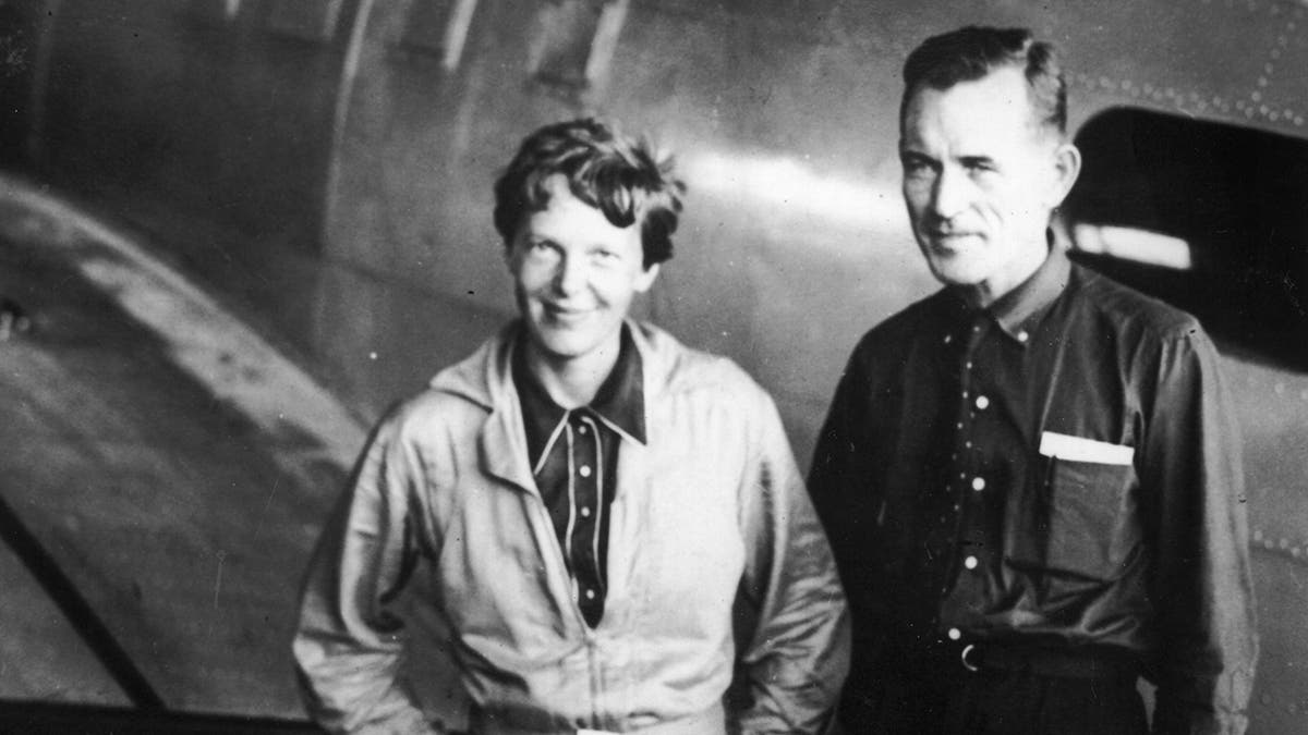 Amelia Earhart and Captain Fred Noonan pictured on June 11, 1937. (Photo by Topical Press Agency/Getty Images)