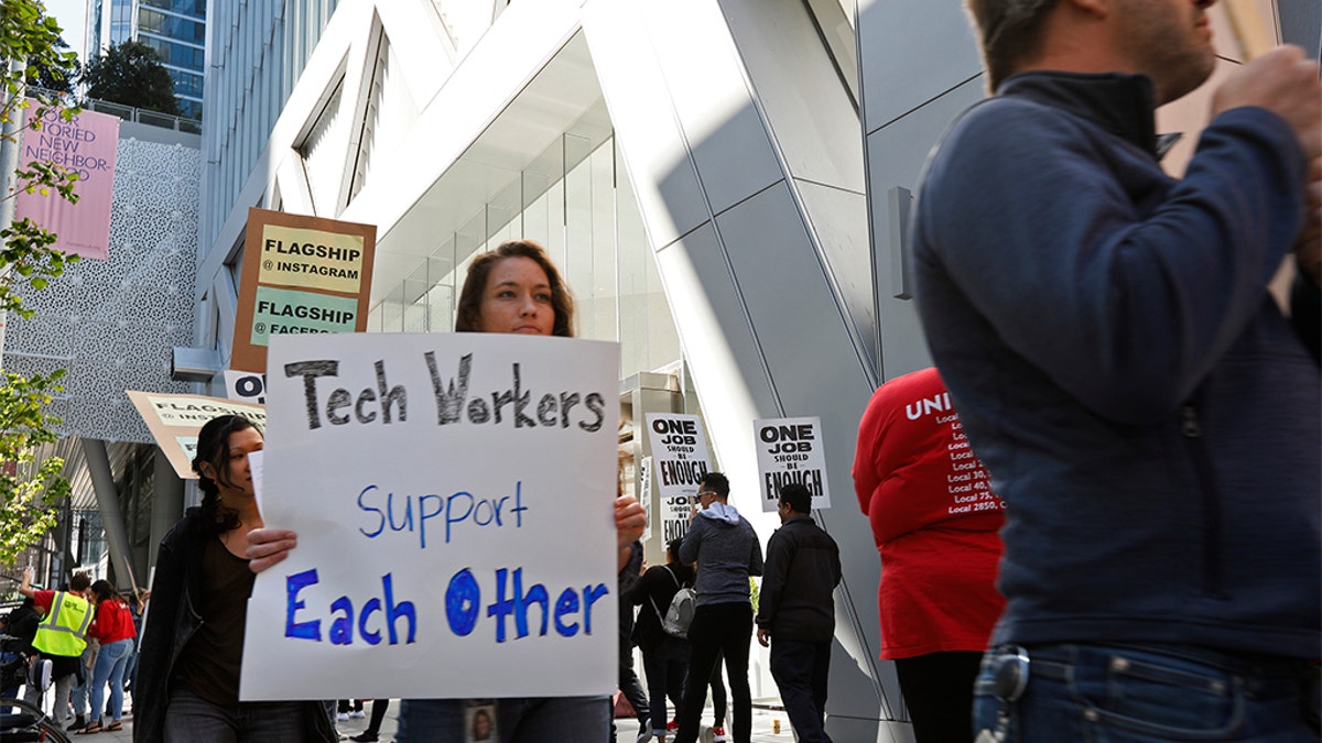 Tech workers marching to support Facebook's cafeteria workers in San Francisco last month. (AP Photo/Samantha Maldonado)