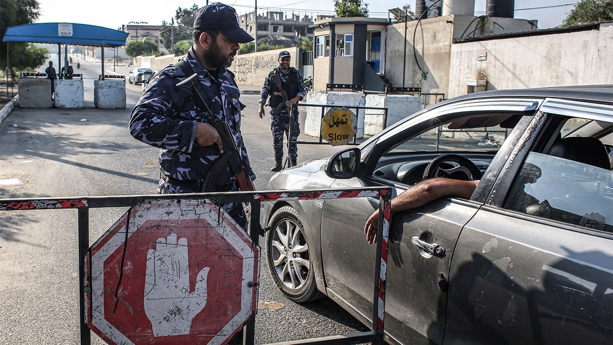 Security forces loyal to Hamas stopping a vehicle at a checkpoint in Khan Yunis in the southern Gaza Strip on Wednesday.