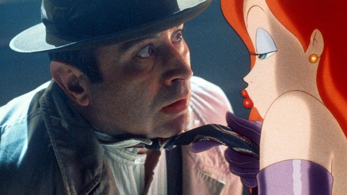 Bob Hoskins is seduced by Jessica Rabbit in a scene from the film 'Who Framed Roger Rabbit', 1988. 