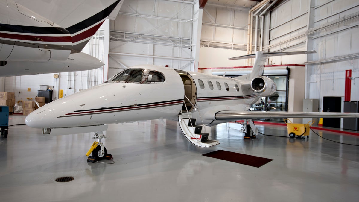 An external shot of a NetJets Inc. Embraer Phenom 300. NetJets, the aviation business of Berkshire Hathaway, is a fractional-jet company whose clients take a stake in planes in exchange for flight hours.