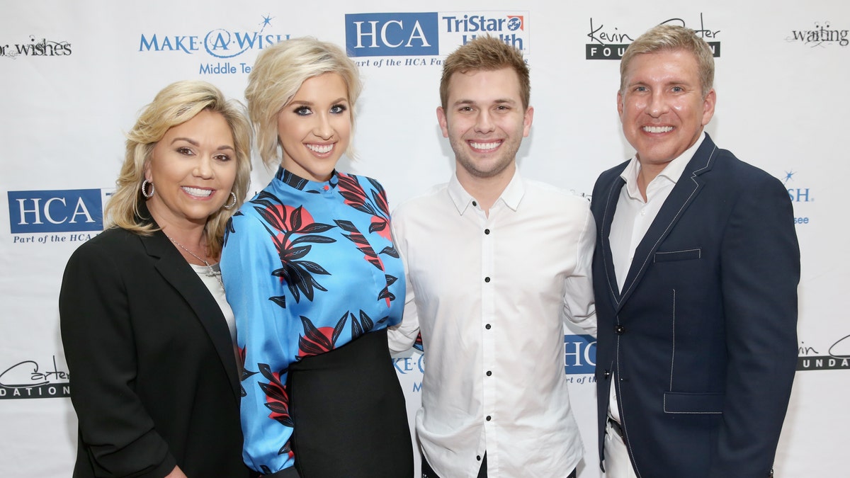 NASHVILLE, TN - APRIL 24: (L-R) Julie Chrisley, Savannah Chrisley, Chase Chrisley and Todd Chrisley from reality show, Chrisley Knows Best, attend the 17th annual Waiting for Wishes celebrity dinner at The Palm on April 24, 2018 in Nashville, Tennessee.