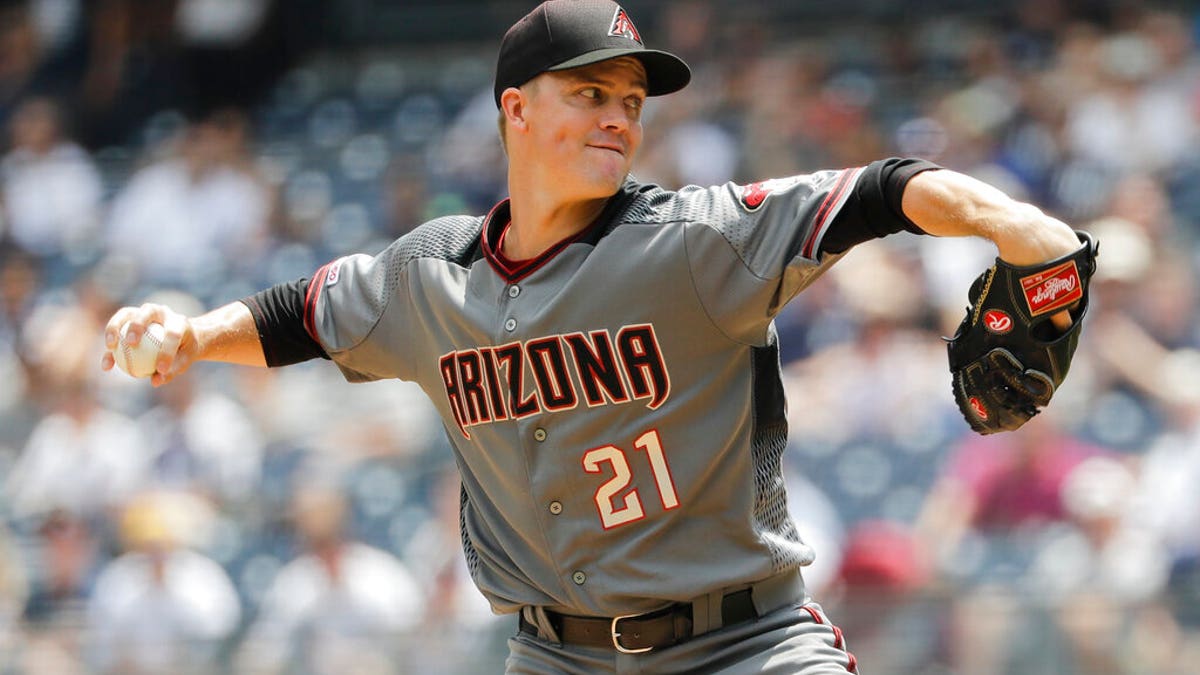 Arizona Diamondbacks' Zack Greinke delivers a pitch during the first inning of a baseball game against the New York Yankees Wednesday, July 31, 2019, in New York. (AP Photo/Frank Franklin II)