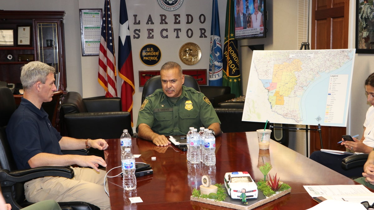 U.S. Citizenship and Immigration Services Acting Director Ken Cuccinelli is briefed by Laredo Sector Chief Border Patrol Agent Felix Chavez. (Adam Shaw/Fox News)