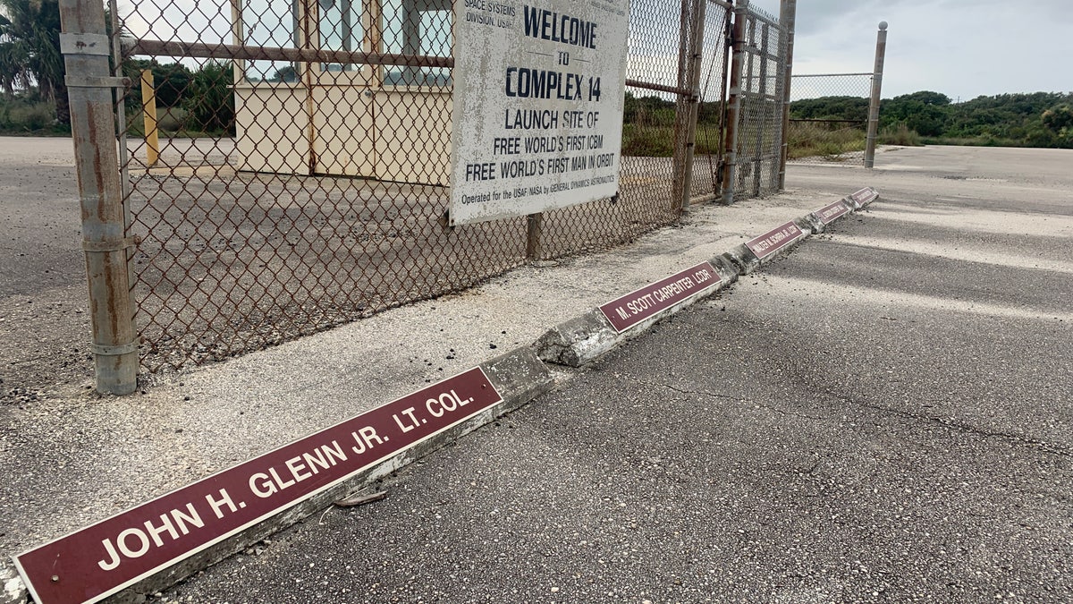 Some historic launch pads in Cape Canaveral appear frozen in time. Astronaut John Glenn, the first American to orbit the Earth, still has a labeled parking space at the entrance to Launch Compex 14.