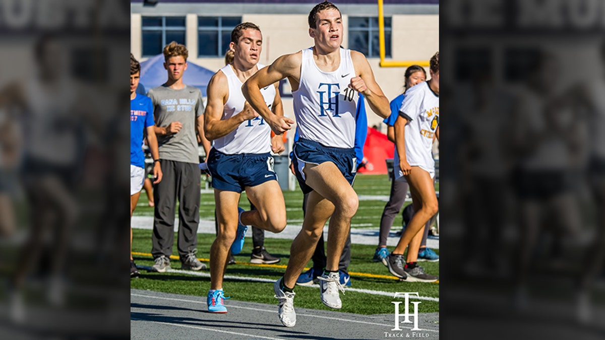 Twin brothers Joshua and Jacob Lowe running in high school. (Photo courtesy of Dave Lowe)