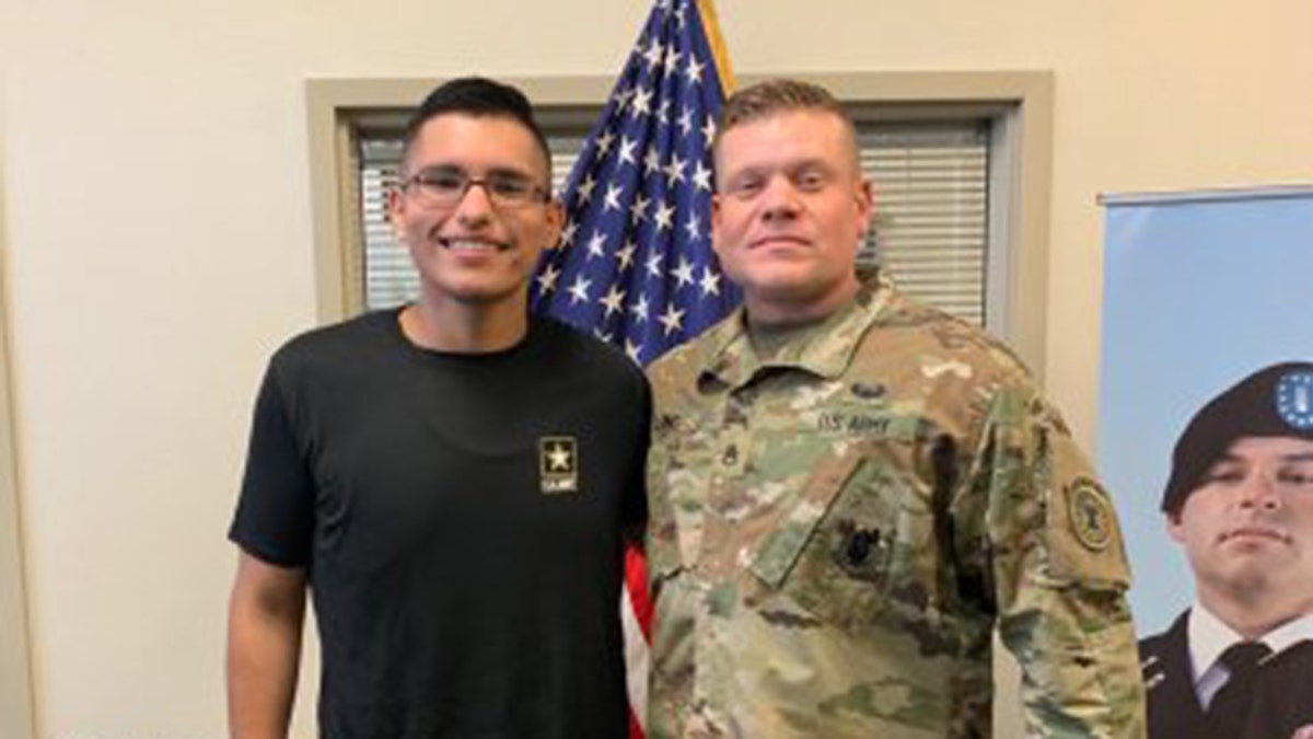 Luis Enrique Pinto Jr., 18, who lost 113 pounds over a seven-month period, and his recruiter, Staff Sgt. Philip Long. (Photo courtesy U.S. Army)