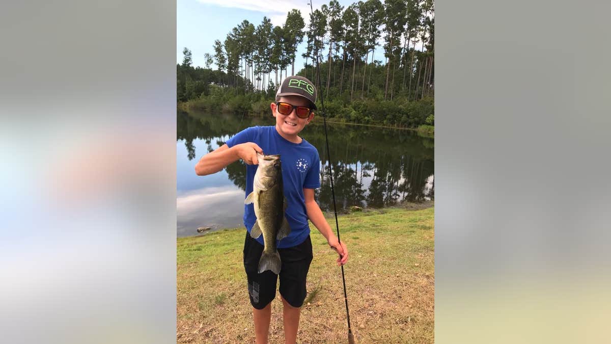 The brave boy was back to fishing the next day.