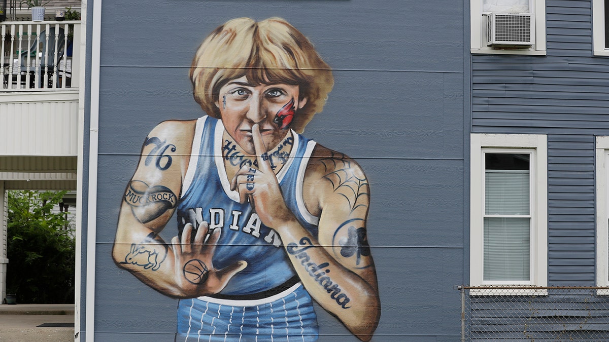 A mural of former NBA star Larry Bird is seen on the side of a multi-family residence in Fountain Square, Wednesday, Aug. 21, 2019, in Indianapolis. (AP Photo/Darron Cummings)