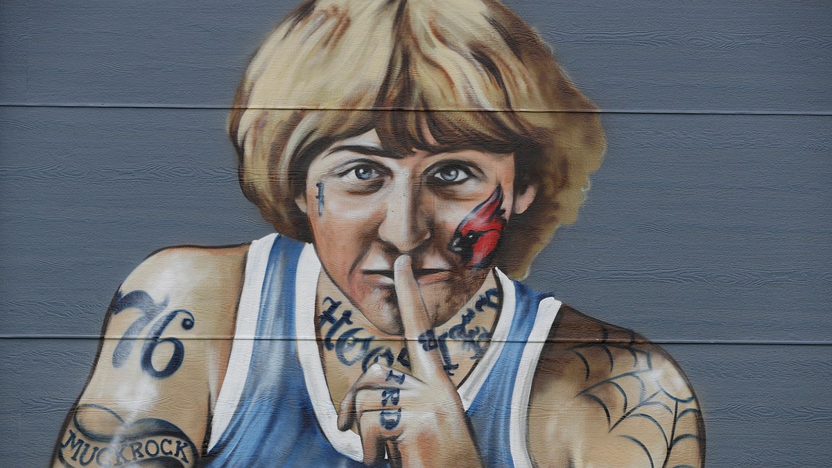 Bird's attorney, Gary Sallee, says the former Indiana Pacers executive "needs to protect" his brand and "doesn't want to be seen as a tattooed guy." Artist Jules Muck says she was just trying to be funny. The mural is a replica of Bird's appearance on a 1977 Sports Illustrated cover when he played college ball for Indiana State. (AP Photo/Darron Cummings)