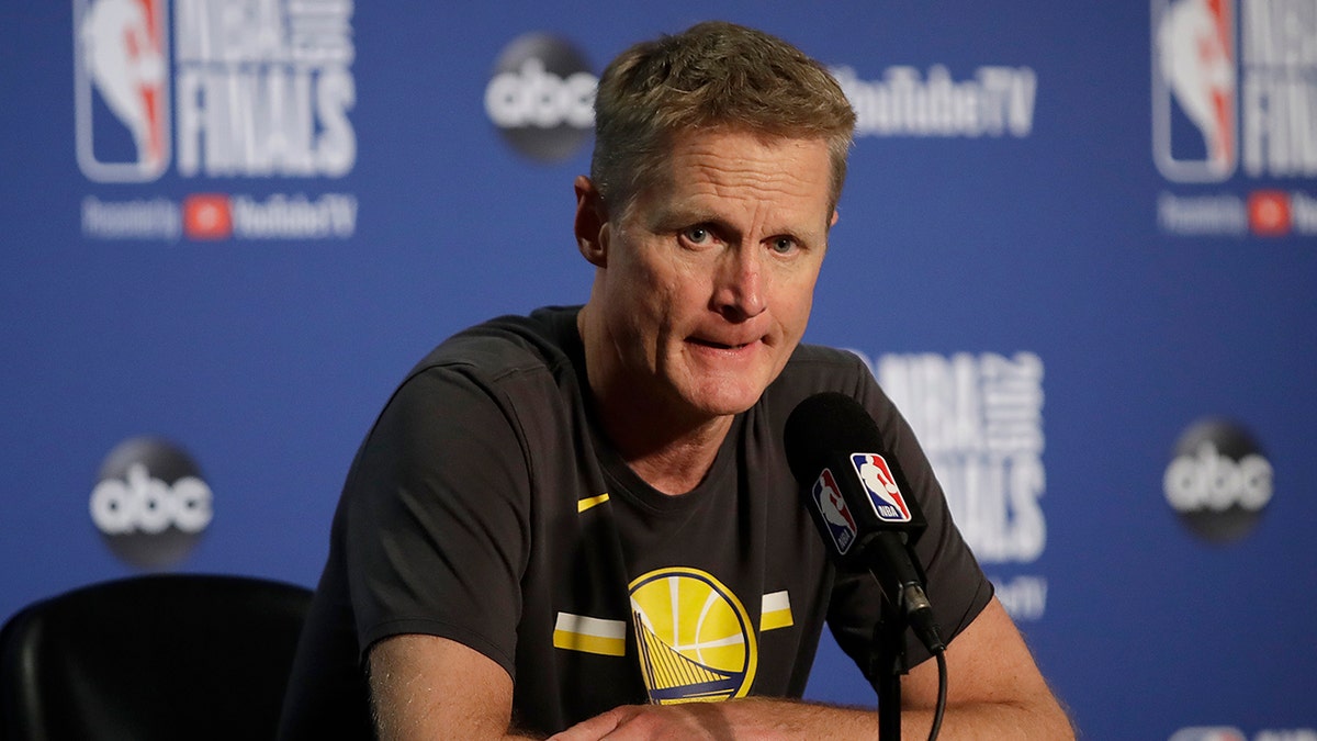 FILE - In this June 5, 2019, file photo, Golden State Warriors head coach Steve Kerr speaks at a news conference after Game 3 of basketball's NBA Finals against the Toronto Raptors in Oakland, Calif. Kerr knows that a new era of Warriors basketball is about to begin. He just doesn't know what that means yet. (AP Photo/Ben Margot, File)