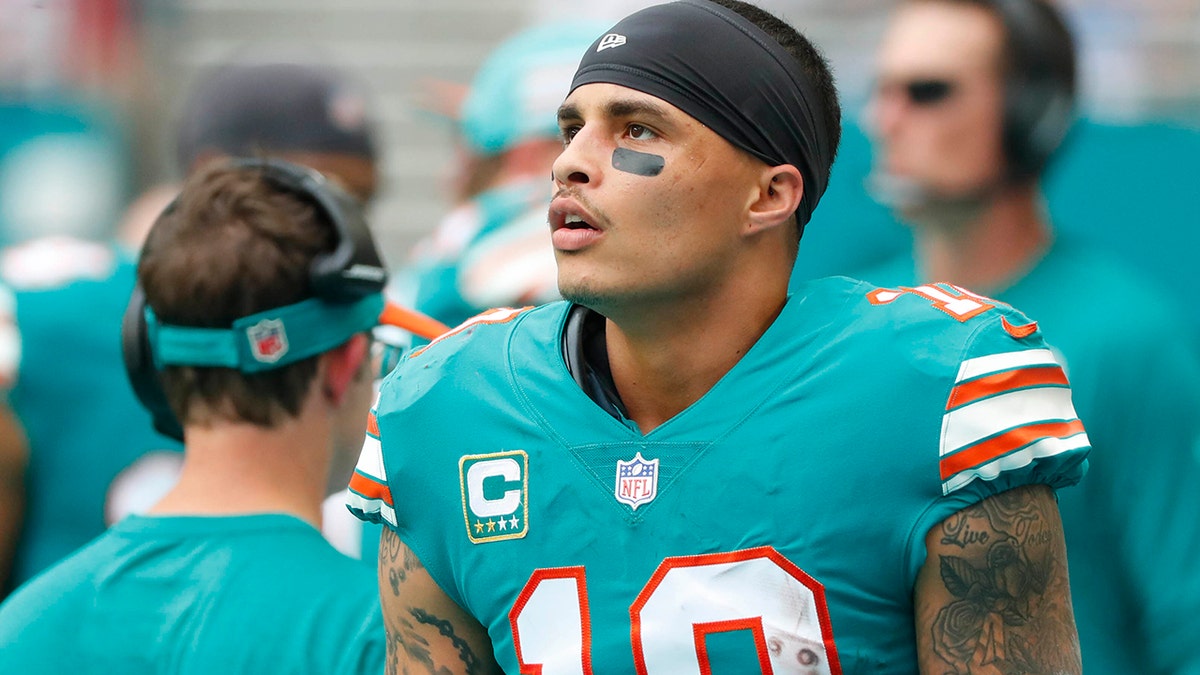 FILE - In this Dec. 9, 2018, file photo, Miami Dolphins wide receiver Kenny Stills (10) stands along the sideline during the first half of the team's NFL football game against the New England Patriots in Miami Gardens, Fla. (Associated Press)