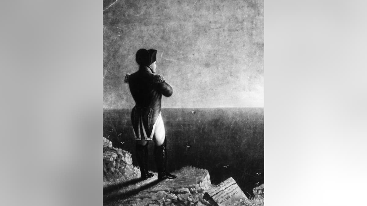 Napoleon I (1769 - 1821) looking out to sea on the island of St Helena, where he was exiled from 1815 to his death. Original Artwork: Engraving by JE Coombe after a painting by BR Haydon.