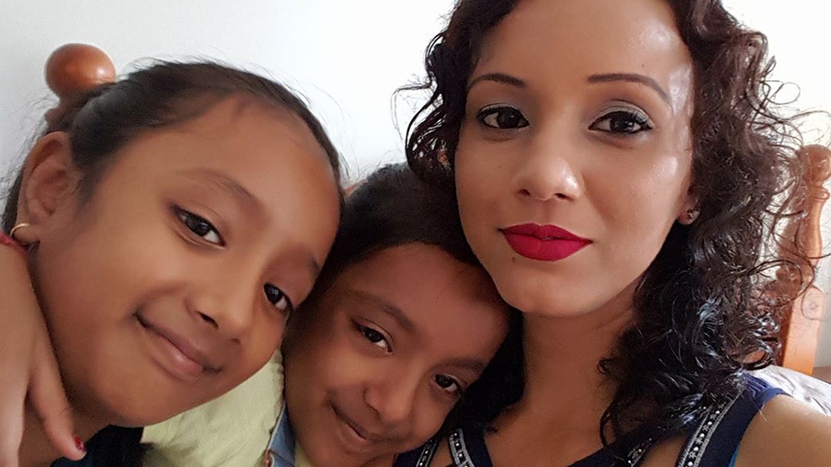  Nileshni Kajal, 34, with her daughters, Sana,11, and Samara, 8.