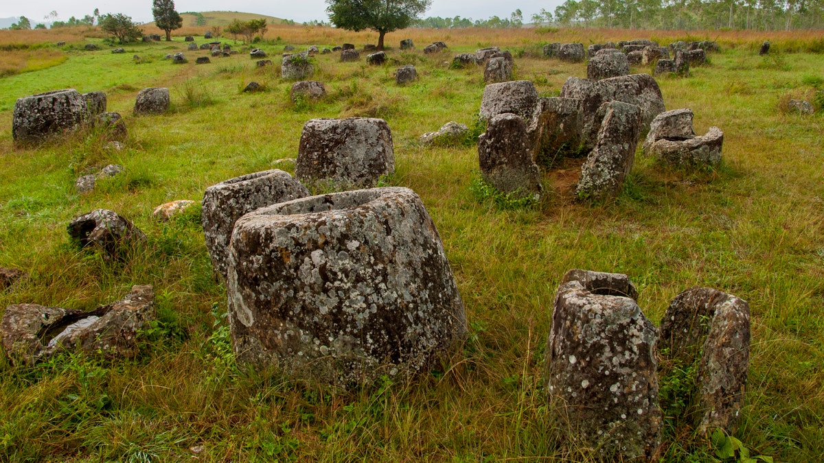 The Plain of Jars, seen in this undated file photo, consists of thousands of stone jars scattered around the upland valleys and the lower foothills of the central plain of the Xiangkhoang Plateau in Laos and is dated to the Iron Age (500 BC to AD 500). It is one of the most important prehistoric sites in Southeast Asia. (Photo by: Avalon/Universal Images Group via Getty Images)
