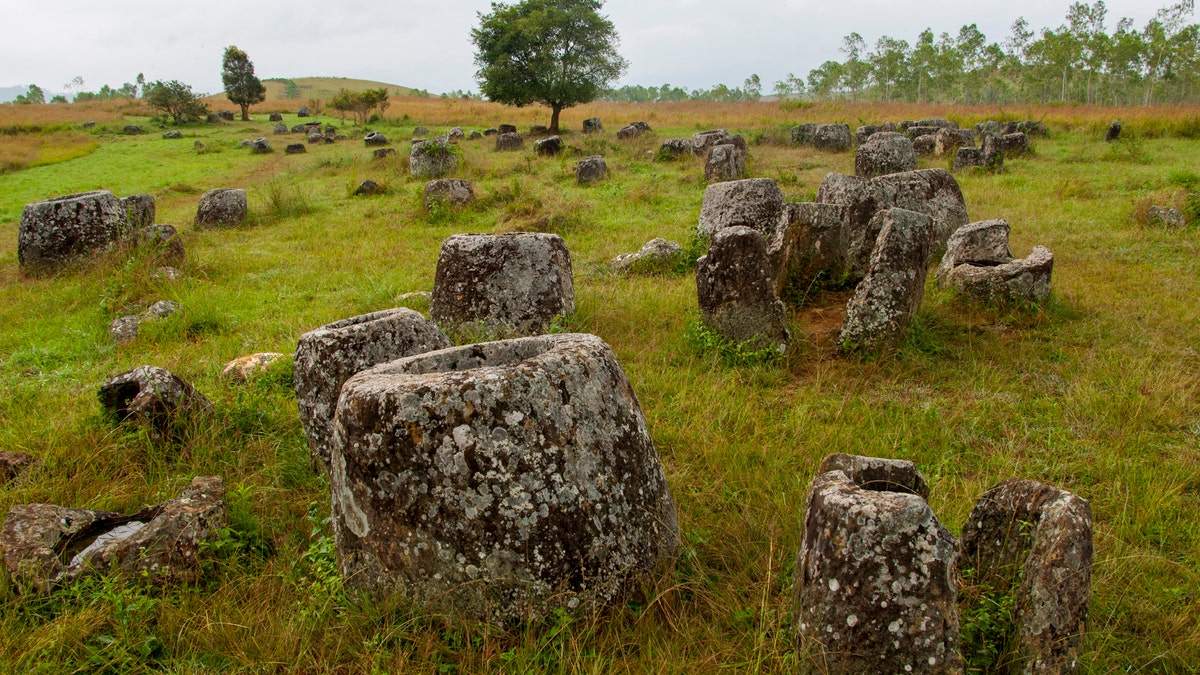 The Plain of Jars, seen in this undated file photo, consists of thousands of stone jars scattered around the upland valleys and the lower foothills of the central plain of the Xiangkhoang Plateau in Laos and is dated to the Iron Age (500 BC to AD 500). It is one of the most important prehistoric sites in Southeast Asia. (Photo by: Avalon/Universal Images Group via Getty Images)