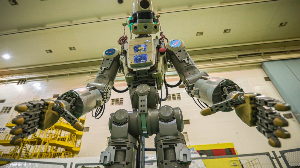 In this photo taken on Friday, July 26, 2019, and distributed by Roscosmos Space Agency Press Service, the robot is seen before being loaded into the Soyuz capsule.
