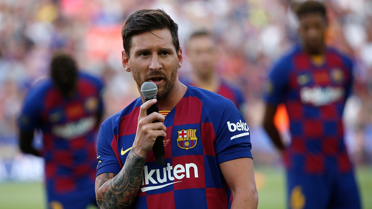 Barcelona forward Lionel Messi addresses the crowd prior of the Joan Gamper trophy soccer match between FC Barcelona and Arsenal at the Camp Nou stadium in Barcelona, Spain, Sunday, Aug. 4, 2019. (AP Photo/Joan Monfort)