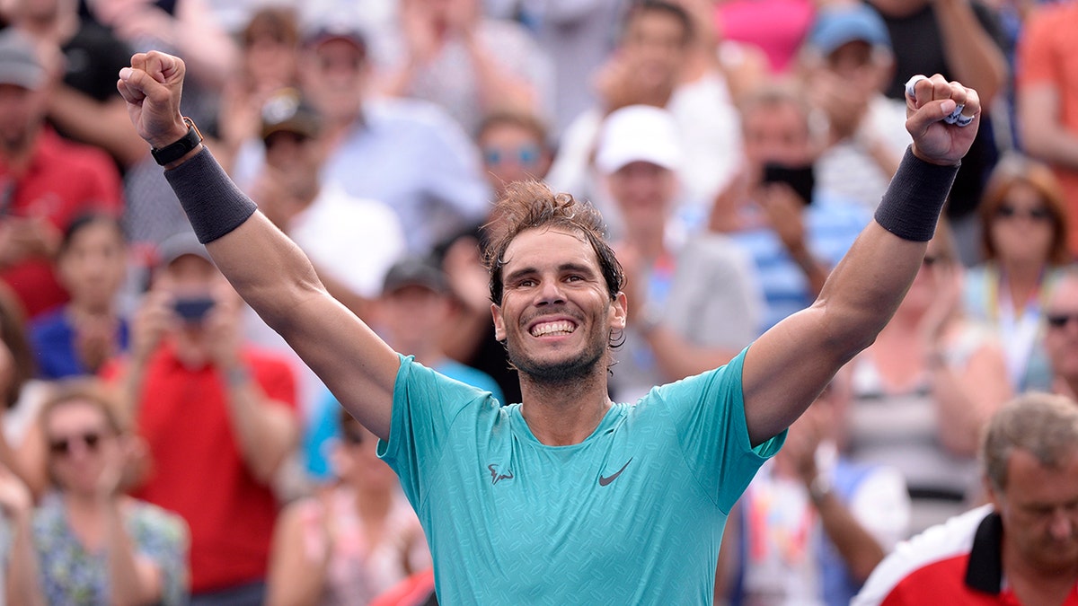 Spain's Rafael Nadal celebrates his win over Russia's Daniil Medvedev in the final of the Rogers Cup tennis tournament in Montreal, Sunday, Aug. 11, 2019. (Paul Chiasson/The Canadian Press via AP)