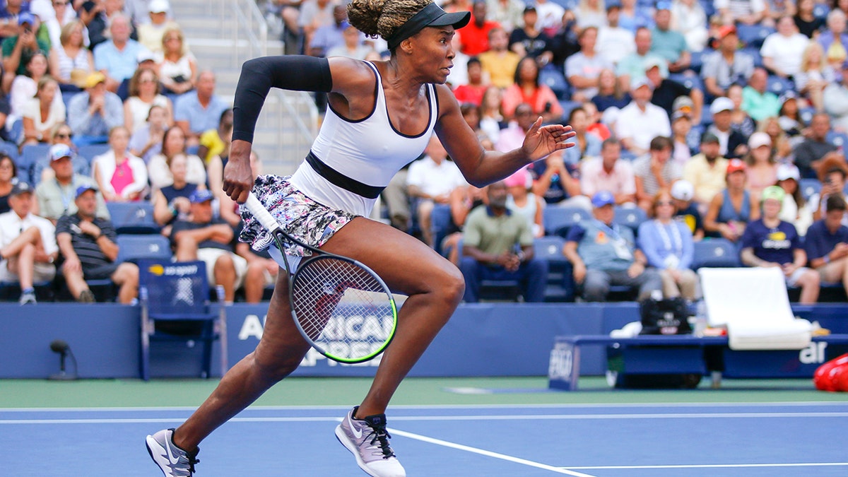 Venus Williams, of the United States, chases down a shot from Zheng Saisai, of China, during the first round of the US Open tennis tournament Monday, Aug. 26, 2019, in New York. (AP Photo/Eduardo Munoz Alvarez)