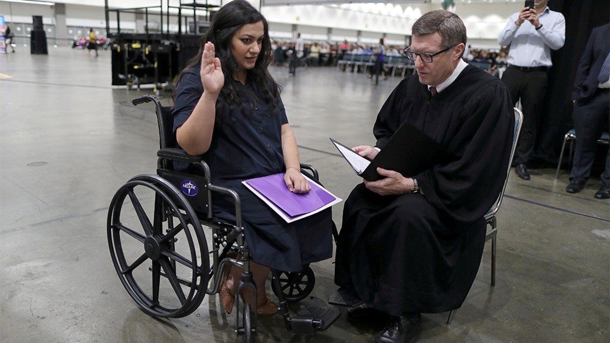 Tatev, 31, who is from Armenia and has lived in the U.S. for 17 years, said she experienced contractions before her U.S. citizenship ceremony.
