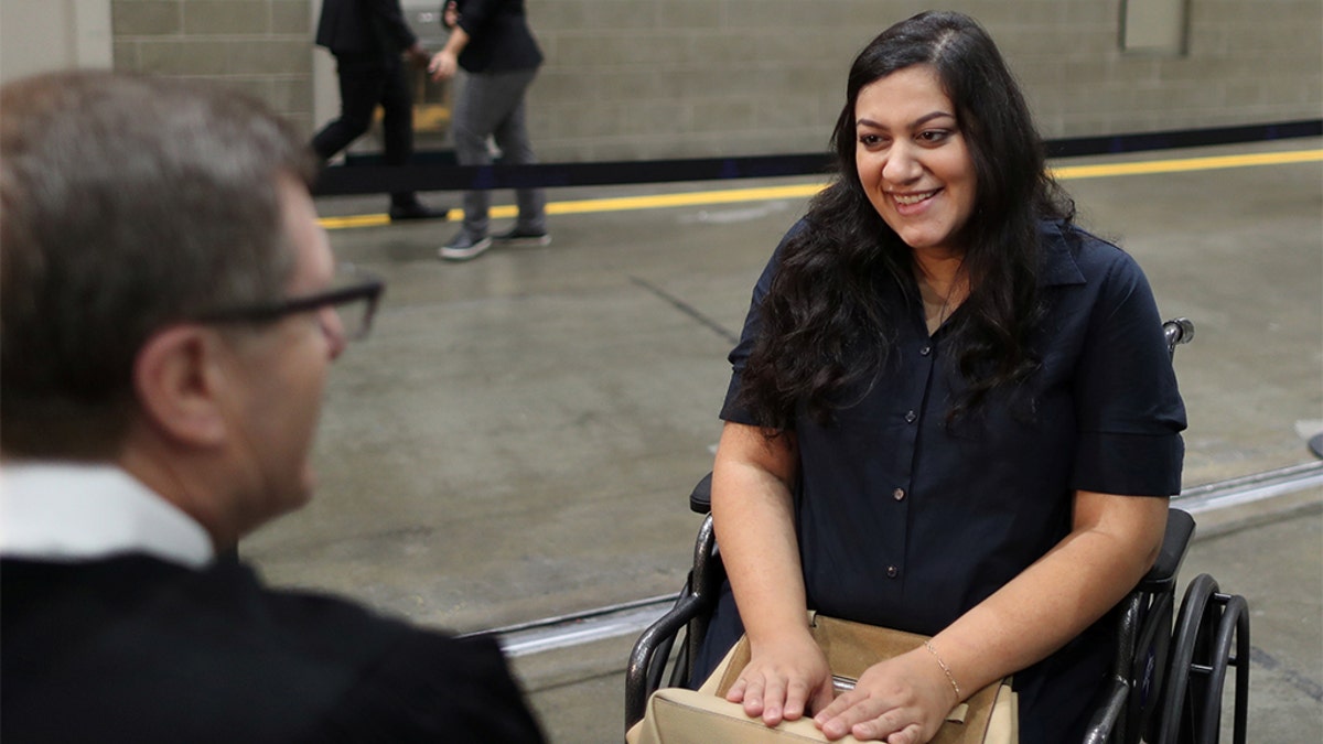 Tatev, who has lived in the U.S. for 17 years, went into labor before her U.S. citizenship ceremony and refused to go to hospital until she was sworn in as a U.S. citizen on Aug. 22, 2019. (REUTERS/Lucy Nicholson)
