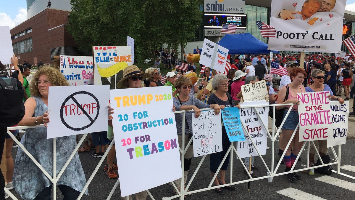 Anti-Donald Trump protests outside of the Southern New Hampshire University Arena in Manchester, NH, ahead of the president's rally, on Thursday August 15, 2019