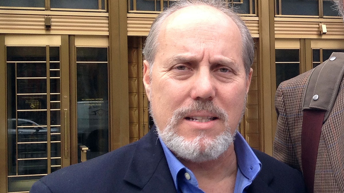 Ben Sprecher appears outside federal court after swindler Mark Hotton was sentenced to 31 months in federal prison in October 2014. Hotton conned $65,000 from the producers of 