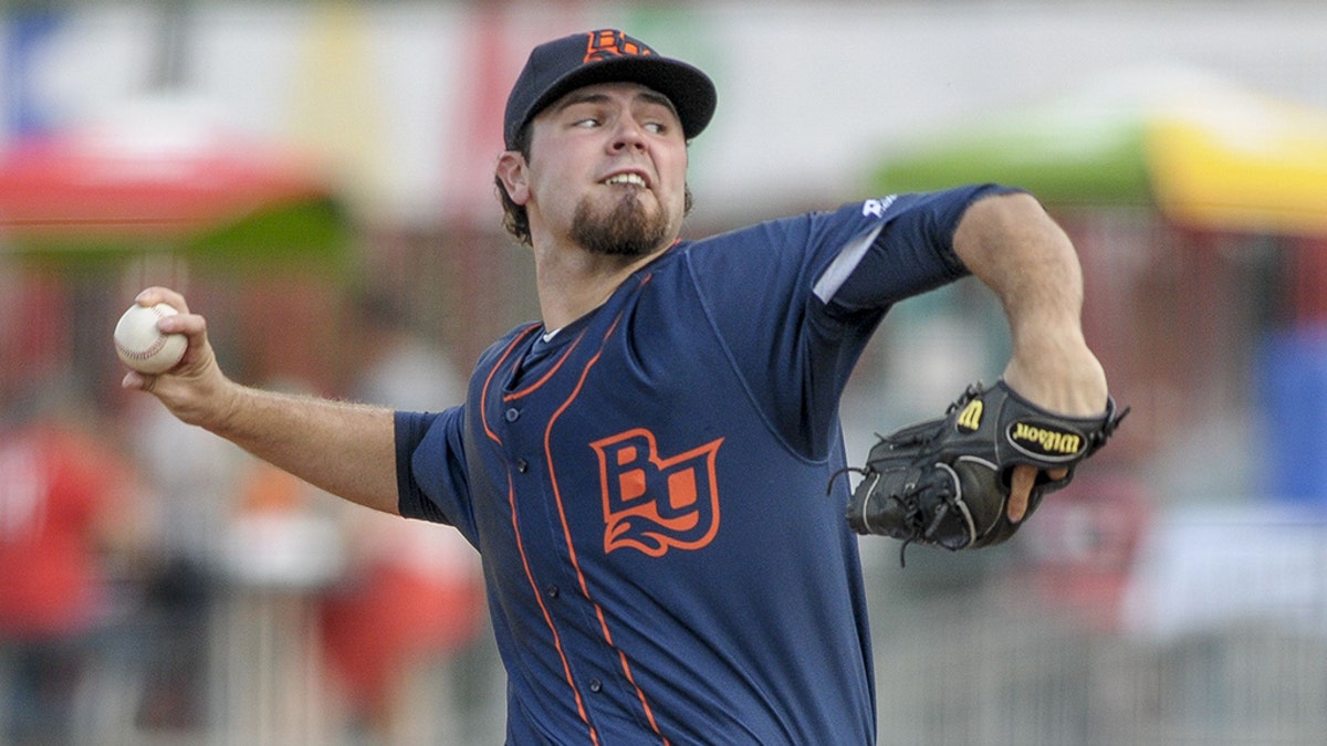 Blake Bivens (38) throws a pitch during a Bowling Green Hot Rods game.